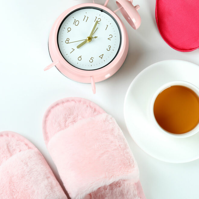 Nightwear accessories - slippers, alarm clock, eye mask, cup of tea