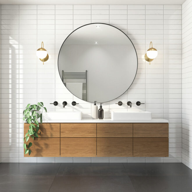 Modern minimal bathroom with round mirror