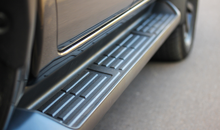 Running board on side of car